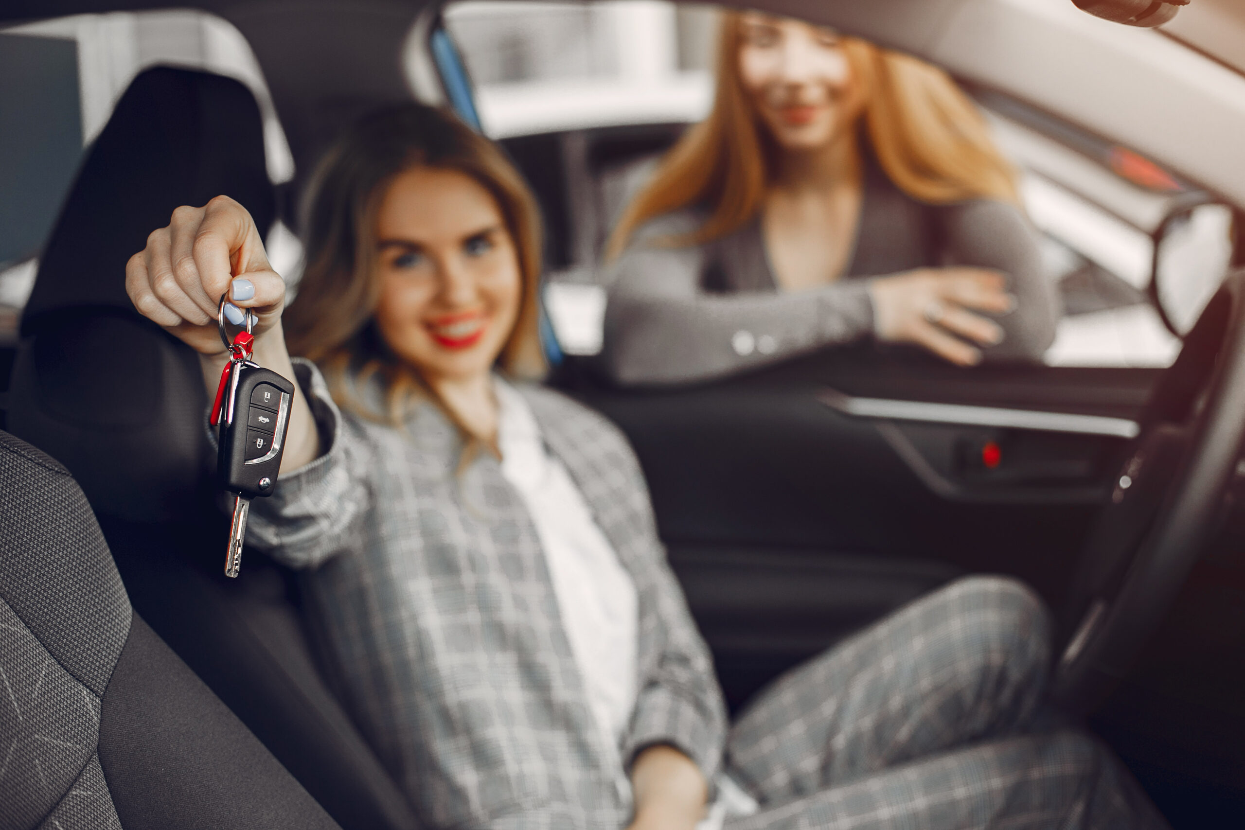 Customer receiving car keys at pick-up